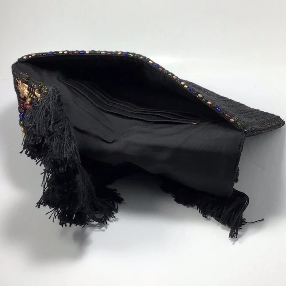 Stella & Dot Taj Black/Metallic Multicolored Woven Clutch.